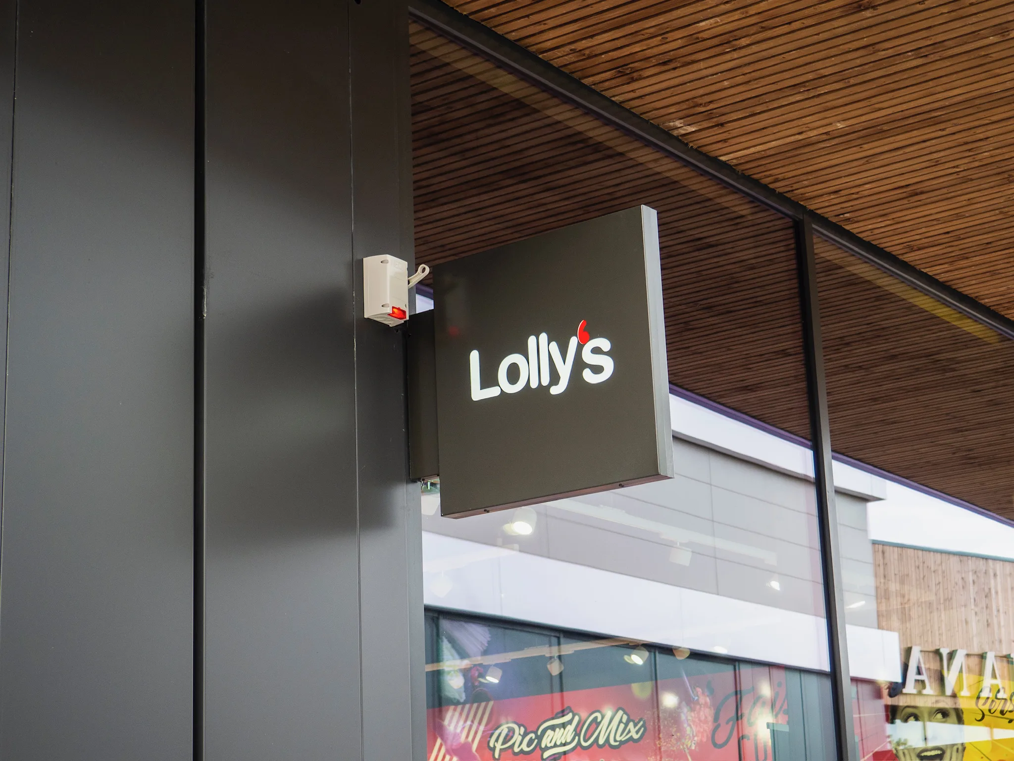 Enseigne drapeau - Lollys