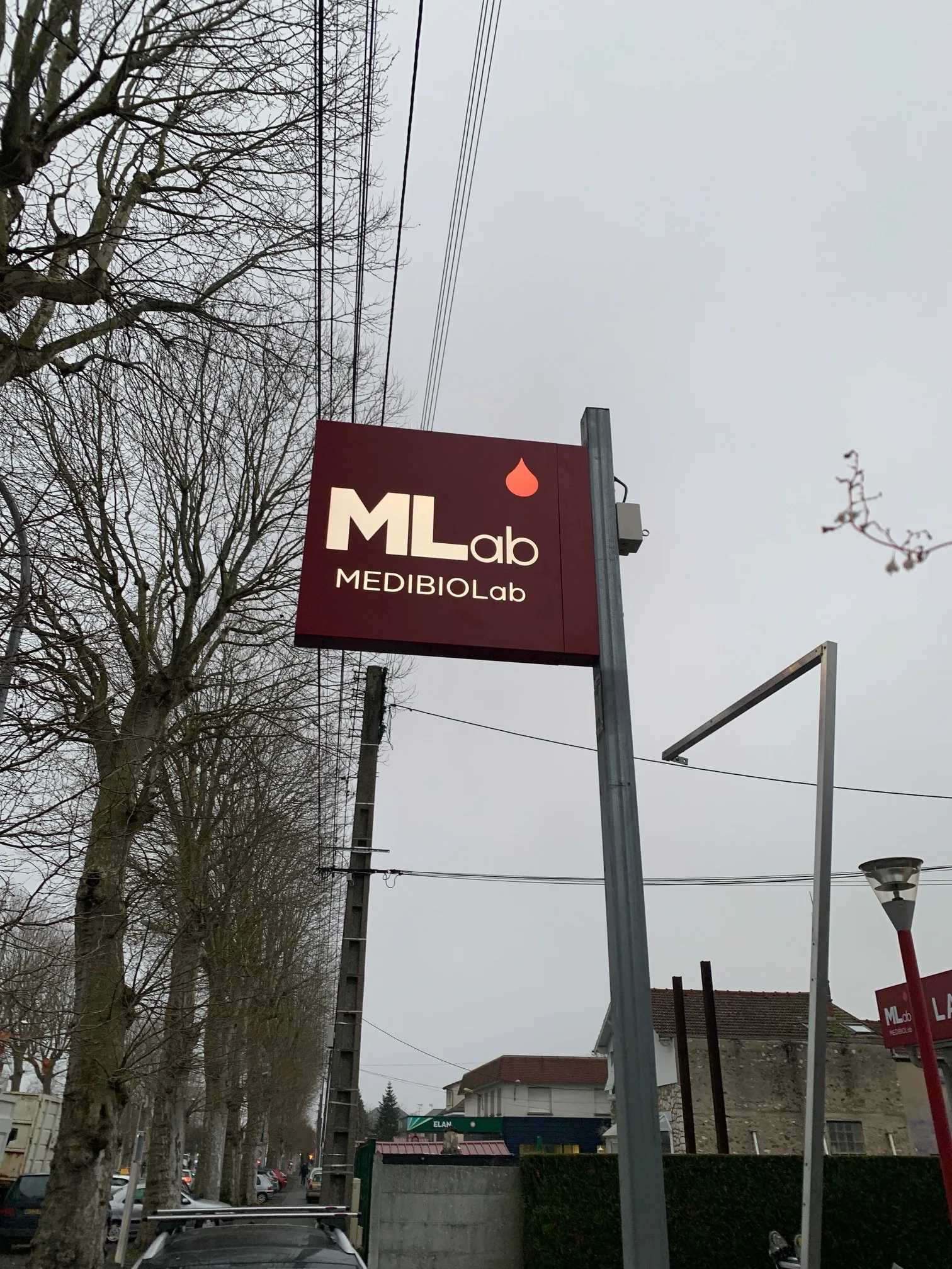 Enseigne drapeau - MLab Médibiolab